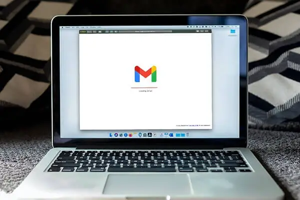 laptop with gmail preview on screen