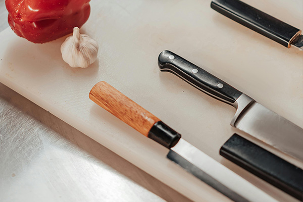 different types of chef knives on cutting board