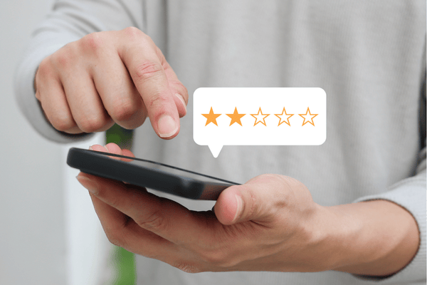 typing on phone on review website.