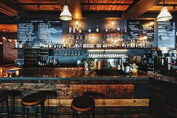 Bar in a restaurant with menu on the wall