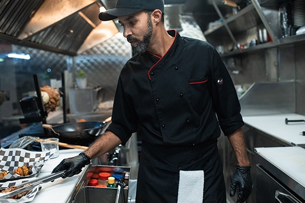 Food truck head chef cooking