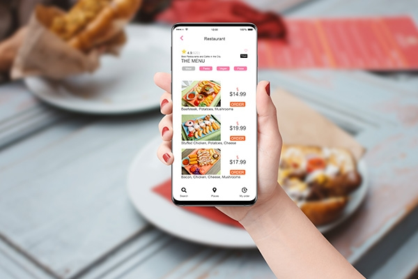 looking at phone with menu on screen.