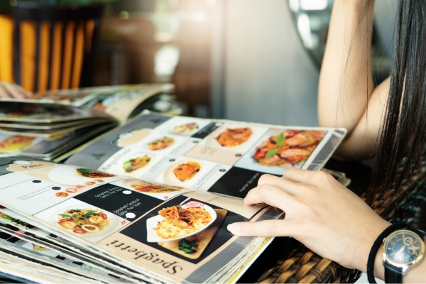 looking at menu images at restaurant