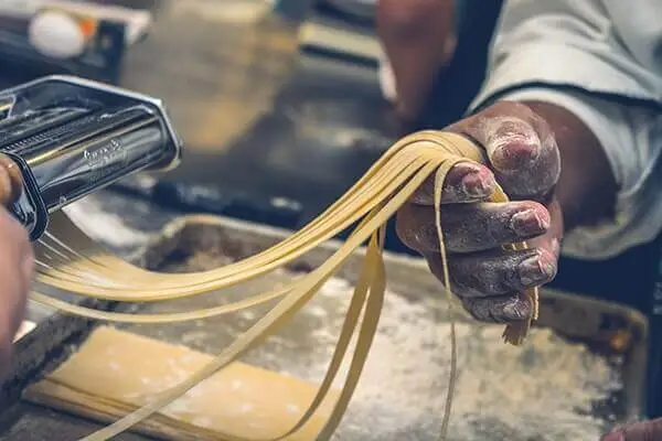person making pasta from scratch