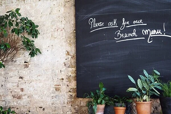Chalkboard sign that says