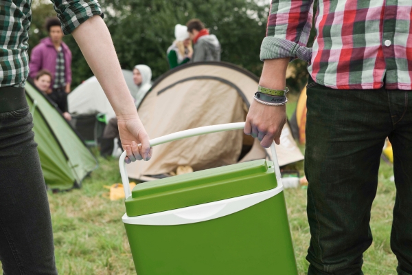 holding cooler on camping trip