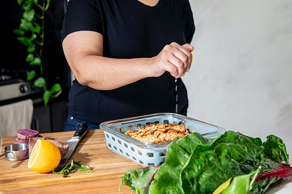 person cooking a meal