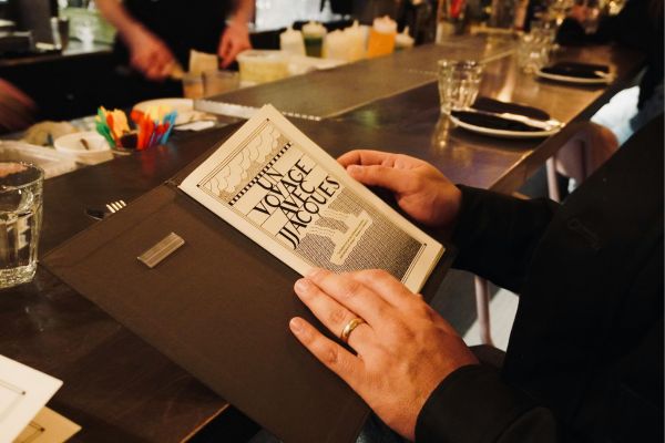 man looking at menu